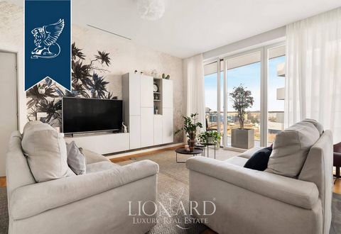 In Milan's renowned CityLife district, there is an exclusive property for sale that combines the elegance of modern design with high-level living comforts. This luxurious 174-sqm apartment with a 45-sqm panoramic terrace, located on the eighth f...