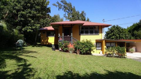 Location, Location, Location...A five minute walk to Hawi's downtown restaurants, shopping and services. Darling remodeled Plantation home offers multiple use options with 4 self contained living spaces, designed for comfort and functionality. The ch...