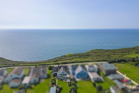 Nestled in the highly sought-after coastal location of East Cliff, Pennard, this exceptional South facing, five-bedroom detached residence boasts breath-taking panoramic ocean vistas spanning Cefn Bryn, Oxwich Bay, Lundy Island, and the Devon coastli...