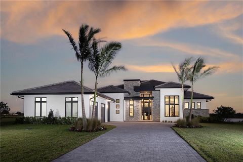 Pre-Construction. To be built. Elegance meets exclusivity in this pre-construction masterpiece, poised to grace a sprawling 1.15-acre premium homesite in phase one of the coveted Lake Club Community. Boasting a custom floor plan with 4,816 square fee...
