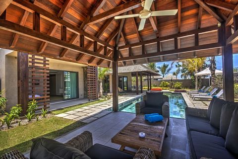 For sale: Luxurious 4-bedroom villa with modern facilities and exclusive services close to Grand Baie. With a built area of 479.35 m² on a plot of 1001 m², this villa offers an exceptional living environment. On the ground floor, you'll love the ligh...