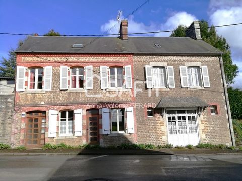 Located in Fougerolles du Plessis with local shops and services (doctors, pharmacy, school, Intermarché 7/7, pmu tobacco bar, restaurant...), beautiful stone town house comprising on the ground floor: entrance, open fitted and equipped kitchen overlo...