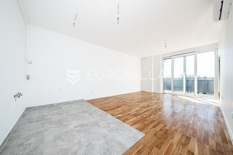 Zagreb, Subsused, new building two bedroom apartment/office NKP 81 m2. It consists of an entrance area, a guest toilet, a living room with a dining room, two spacious bedrooms, a bathroom and a large balcony. Air conditioning in all rooms, floor gas ...