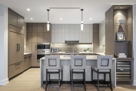 The St Regis Residence, a luxury lifestyle 55 years community. Landscaped courtyard/grounds with a walking path, water features, outdoor fire pits and gardens plus club rooms, indoor pool, gym, screening room and golf simulator are a few signature am...