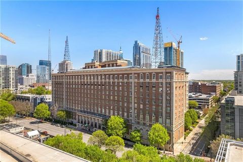 Gorgeous condominium situated within the historic Biltmore House at the vibrant heart of Tech Square. This striking one-bedroom, one-bathroom studio boasts new countertops complemented by pristine white cabinetry, complete with a built-in sink, dispo...