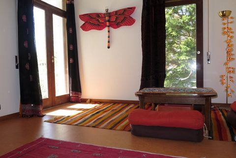 A big cozy light Room (28m2) with 3 big window/doors. Comfortable Warm Lights, A double Bed with a comfortable Futon mattress, + a Couch/single bed, a big wooden working Desk and a design Chair, a short eating Table (Japanese style) with Bolsters to ...