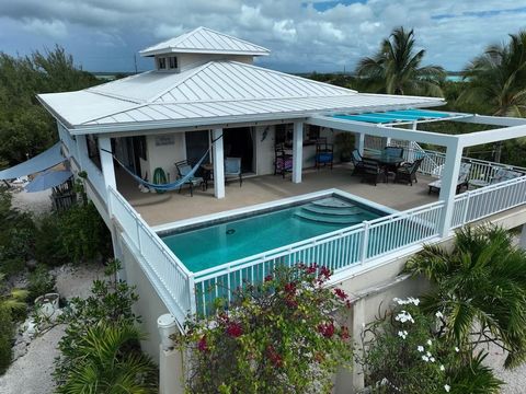 Casa De Isle is a true gem. Nestled in 0.75 acres of lush landscaping it embodies island living at its best. Located on Ocean Point Close it forms part of the Sunset Bay development and is a mere three-minute walk from Taylor Bay beach, one of the is...