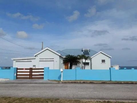 This elegant Barbados home offers a serene lifestyle with breathtaking ocean views, set on a corner lot within a quiet cul-de-sac. Meticulously maintained and thoughtfully designed, this property combines comfort, convenience, and style, making it a ...