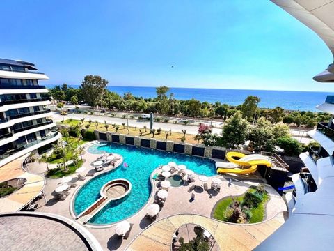 This 1+1 furnished apartment is located in the sought-after Kargicak area of Alanya, offering direct seafront access and modern living amenities. Spanning 55 m2, the apartment is situated on the 4th floor and features an American-style kitchen, 1 bat...