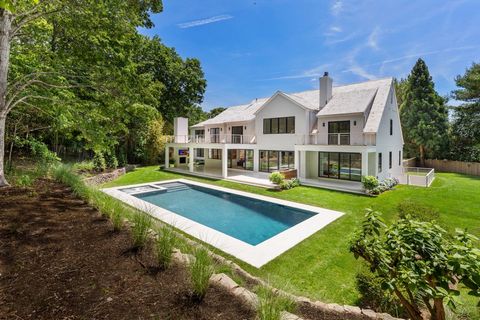 Welcome to 6 Sawmill Lane, a luxurious modern traditional home just outside of East Hampton Village. This stunning 6,800 sq ft, 6-bedroom, 6.5-bathroom residence blends contemporary design with timeless elegance, featuring Maibec cedar wall shingles ...