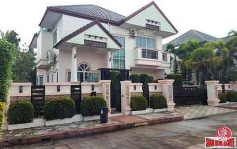 Amazing 250sqm 2 storey house on 850 sqm land for sale in the Huai Yai area of Pattaya. Located in the Baan Dusit (village 1) the home was used as a show-house and carefully looked after and maintained. There is a spacious open living plan with a liv...