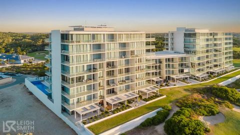 Luxurious Waterfront Living Leigh Smith is thrilled to present a lifestyle of unparalleled elegance at the prestigious Oceanique Apartments. Nestled on the 7th floor, this exceptional property offers breathtaking panoramic ocean views and overlooks t...