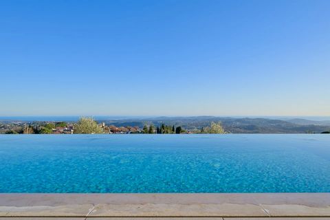 Riviera Countryside, Cannes back country: Discover this stunning contemporary villa perched on a hill within a secure gated estate, offering sweeping panoramic sea views stretching from Saint-Jean Cap Ferrat to the Esterel mountains. Crafted with top...