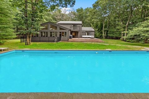 Welcome to this recently renovated magnificent 6-bedroom estate nestled on nearly 2 acres, perfectly situated near the sought-after Barnes Landing area. This property is a true gem for beach enthusiasts, located just 2.5 miles from the charming Villa...