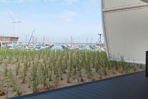 Moderne und komfortable Ferienwohnung mit Blick auf die Ostsee und den Yachthafen. Genießen Sie die schöne Panoramaaussicht auf die Ostsee von früh bis abends. Die moderne und komfortabel eingerichtete Wohnung besteht aus einem offenen Küchen-Wohnber...