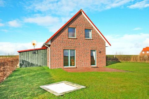 Not only if you want to escape the big city, you will feel completely at home in this detached holiday home with large garden: The cozy and tasteful interior leaves nothing to be desired and the great location directly on the dike foreland is the hig...