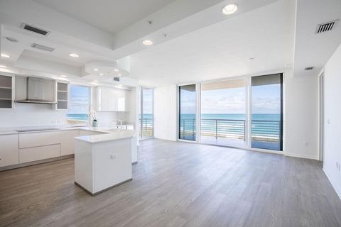 Step into this never-lived-in oceanfront haven, a canvas awaiting your personal touch. Only 12 units in a boutique building,enjoy unobstructed direct ocean views.The open kitchen with Thermador appliances is illuminated by natural light through floor...