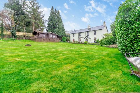 Nestled within beautiful, undulating countryside north of Cardiff this renovated dream home offers an idyllic pocket of peace, hidden away on a dead-end lane. The sprawling, stylish home occupies an enviable location, commutable to the capital yet su...