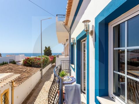 Nestled in a quiet cobbled street in the centre of the quaint old fishing village of Burgau, close to all the amenities the village has to offer, this typical village house has been cleverly redesigned to allow optimal rental income. Split into two i...