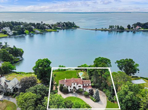 This elegant, waterfront Mediterranean home showcases dazzling sunrise and sunset views. There is direct water access ideal for kayaking and paddle boarding, a heated pool, limestone terrace and an English Garden set on 1.09 private acres overlooking...