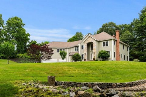 Welcome to this extraordinary custom-built William Barrett estate located at 44 Mill Road, North Andover, MA. This elegant and modern 14-room, 6-bedroom, 5-bathroom home is nestled on an expansive nearly 2-acre wooded and magnificently landscaped lot...