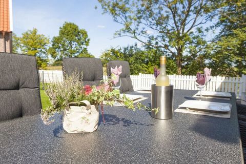 The holiday home Jan was set up with great attention to detail. The light-flooded living/dining area is equipped with a stylish stove. The modern fitted kitchen adjacent to the dining area leaves nothing to be desired due to its equipment. On the gro...
