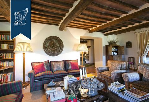 This typically-Tuscan farmhouse girdled by hectares of grounds for sale is nestled in an amazing landscape in the heart of Chianti. This three-floored typically-Tuscan estate sprawls over approximately 720 m² and exhibits bare stone walls studded wit...