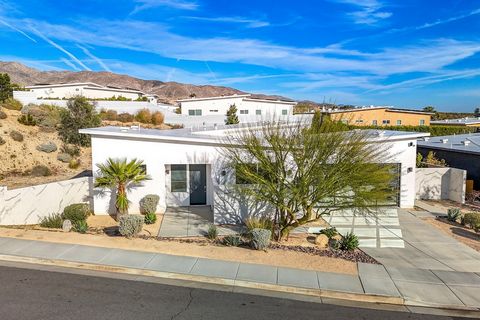 Welcome to your oasis of modern living! Vista Palms finest. 13910 Valley View Court. Nestled at the pinnacle of a serene cul-de-sac, this Mid-Century Modern gem beckons with its sleek design and desert tranquility. Boasting luminous clerestory window...