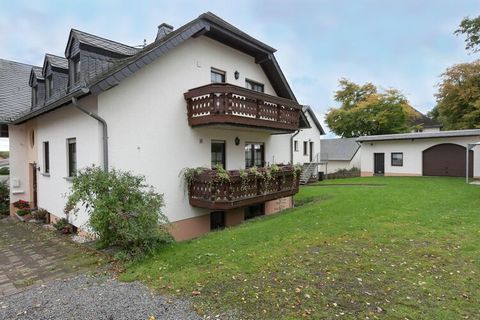 This apartment with a sauna to unwind, in Eschfeld has a peaceful location. With 2 bedrooms for 4, it is ideal for a family. There is fitness equipment so that you can flex your muscles even while on holiday. Enjoy yummy delicacies 5 km away at resta...