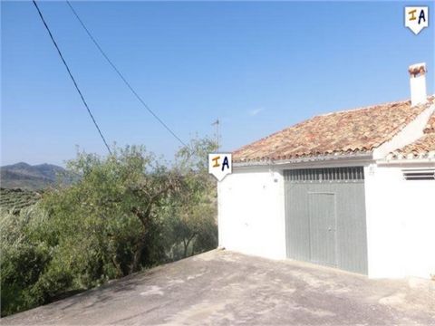 This 4 to 5 bedroom semi-detached Country House is set within circa 9,000m2 of land with many olive trees close to the popular town of Castillo de Locubin in the Jaen region of Andalucia. It has its own private drive. The entrance to the property tak...