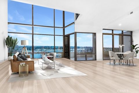 Embrace the sheer magic of this extraordinary penthouse! It's not just a home; it's a sanctuary for those who revel in the enchanting beauty of the bay and beach, while being perfectly nestled within the heart of Marina Del Rey. Prepare to be captiva...