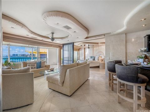 Say Aloha to true Beachfront Luxury Living on the Gold Coast at Sans Souci! This Unique 907 Unit is encapsulated with the Diamond Head view greeting you at your front door and the expansive Ocean View and City-line of Waikiki from your massive covere...