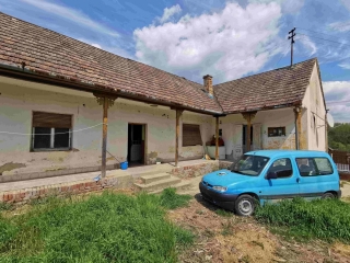 Price: €23.658,00 Category: House Area: 121 sq.m. Plot Size: 2942 sq.m. Bedrooms: 1 Bathrooms: 1 Location: Countryside A renovation project in a good village in the beautiful south of Hungary. The house is no less than 121 m2 in size and built of sto...