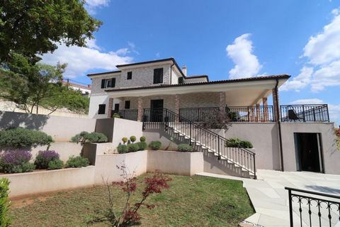 Exclusive villa with panoramic views of Kvarner in Kostrena! The villa of 250 sq.m. is located on a hill above the beaches of Kostrena and was built on a cascading plot of 1000 m2. We start from the garden in which a lot of attention has been paid, s...