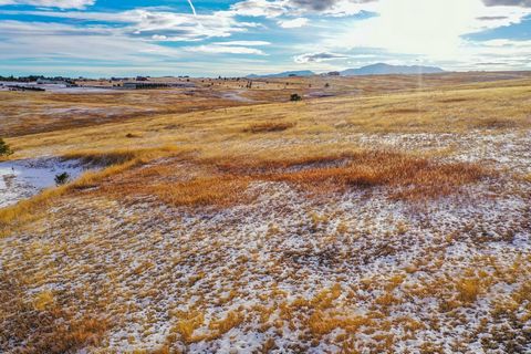 Located north of Colorado Springs, this 15-acre property is the perfect home site with everything a Colorado land buyer is looking for: a quiet rural setting, an unmatched mountain view, gently sloped topography (to accommodate that walk-out basement...