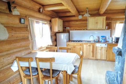 A fully equipped wooden log house for 5 people with two bedrooms upstairs: one for two and the other for three people. The ground floor of the house is a cozy living room with a fireplace. There is also a comfortable kitchenette with a fridge and sto...