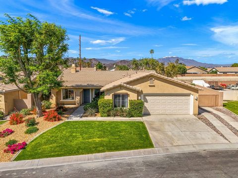 Quiet, gated community of Las Brisas North. This home has great curb appeal with a nicely landscaped front yard. Front patio area allows you a place to sit, relax and enjoy your day while taking in the mountain views. Once inside you'll see the vault...