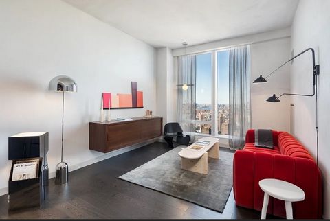 Residence 40J is a 695 square foot one bedroom, one bathroom with an open gourmet kitchen and breakfast bar . This spacious residence faces North East with East River and Williamsburg Bridge views. Warm, modern interiors are brought to life by the re...
