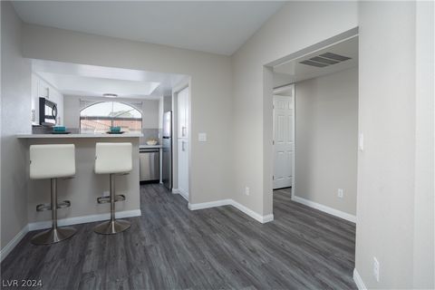 Just wow! You just found a FULLY renovated condo in the coveted Enclaves! Walk in the front door to step onto the beautiful, new luxury vinyl plank floors. The kitchen boasts new cabinets, new quartz countertops, a new stylish backsplash and new appl...