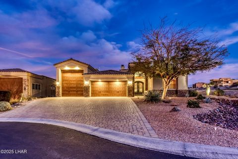 Location The Refuge ~ RV Garage ~ on the Golf Course ~ Views~ This custom home checks all the boxes, from being located in the Beautiful gated community of The Refuge, quiet cul-de-sac with amazing sunset views & breath-taking sunrises over the golf ...