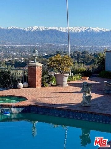 New Co-Ownership Opportunity: Top of the world views from this spacious home in desirably located Sherman Oaks. Overlooking a huge portion of the Valley with incredible views and total privacy on cul-de-sac street with under ground utilites and stree...