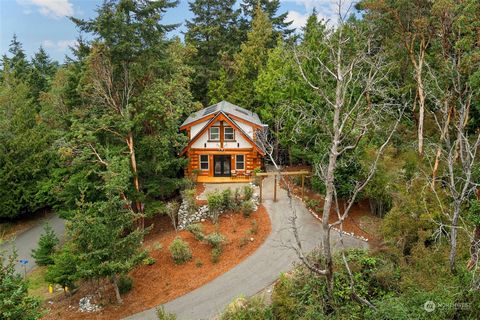 Step into luxury with this beautifully remodeled home, where rustic charm meets modern elegance. Nestled on picturesque Morgan Hill, this custom log home boasts a brand-new roof, ensuring peace of mind for years to come. Cook in style in the gourmet ...