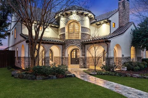 Experience the elegance of this stunning Spanish-style home, where timeless architecture meets modern luxury. With its distinctive tile roof, grand archways, and exquisite designer finishes, this home is truly one of a kind. From the moment you step ...