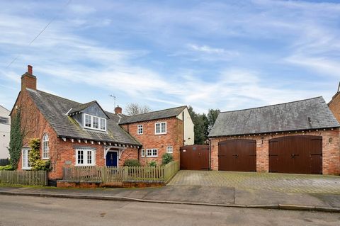 Blue Boar Cottage which dates back to1739 enjoys an idyllic, conservation setting, just a ‘stone’s throw’ from the village green. Full of character and surprisingly spacious this extended home has been recently reconfigured thus creating a new, famil...