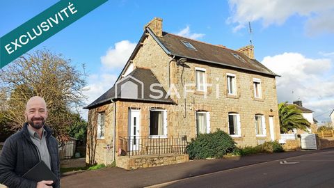 Grande maison en granite dans une commune du littoral