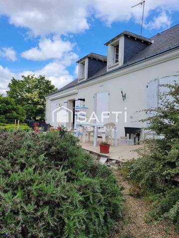 superbe maison avec cour goudronnée avec soin très riche en fleurs et arbustes
