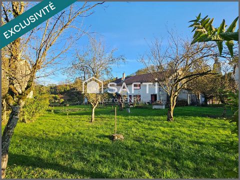 Maison à conforter avec jardin et grange.