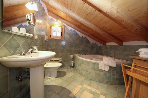 This gorgeous mountain cottage lies in the Bellamonte valley in northern Italy. The mountains right behind the home offers a perfect setting for your holiday. The best part is the hot sauna and Turkish bath in this cold region, which is great for rel...