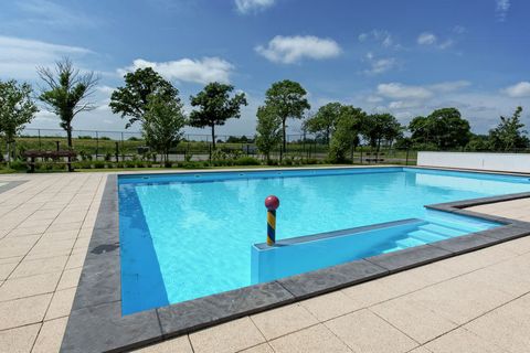 These detached accommodations in Resort de Rijp are all built in typical Zaandam style. You can choose from different, comfortably furnished types. The L-shaped, 6-person De Rijp type (NL-1487-03) is very spacious. The Waterland type offers the choic...