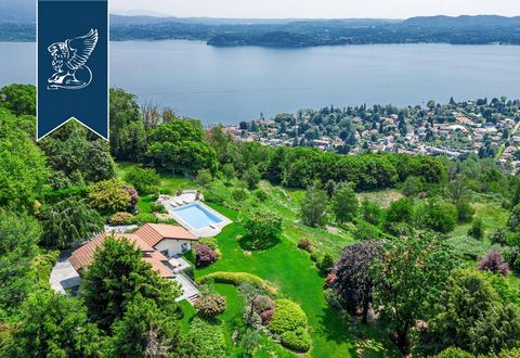 This prestigious villa for sale is in an exclusive panoramic position by Lake Maggiore, in one of the most affluent and elegant districts of the renowned town of Lesa, and offers breathtaking views. Recently renovated and perfectly preserved thanks t...